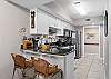 Preparing meals is a breeze in this fully stocked kitchen. 