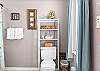 The private bathroom features a separate powder room and wet area for convenience of getting dressed for a night on the town. 