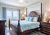 The primary bedroom features comfortable, king bedding and is beautifully furnished to make you feel right at home.