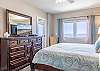 The primary bedroom offers Gulf front views and balcony access.