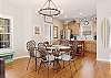 The open kitchen and dining area features plenty of seating for each member of your group to enjoy spending quality time together.