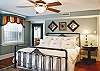 King bed in the 1st of 2 bedrooms with luxury linens and 2 full bathrooms.