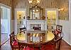 The Main House dining room seats 8 with sun porch to left.