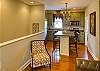 To the left is the staircase (hidden) that leads up to Carriage House. This is the kitchen view with island seating for 4 and all appliances needed!