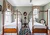 Vintage poster twin beds in 4th bedroom