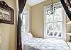 There is one bedroom located on 1st floor along with full bathroom. 3 other bedrooms & bathrooms are on 2nd floor.
