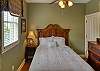 1st bedroom in Carriage House. Queen bed with full en suite bathroom & closet