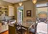 The Main House kitchen overlooks the walled center courtyard 