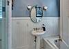Full Bathroom off 3rd bedroom features a soaking tub & walk-in shower.