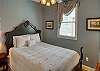 The Carriage House 2nd blue bedroom has Queen size bed & en-suite bathroom