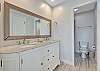 Shared full bathroom on 2nd floor. Includes a walk-in closet for master bedroom.
On Master side of bathroom is this double vanity. Shower & toilet are in private space then a 2nd vanity off the hallway on other side of shower/toilet.
total 3 vanities.