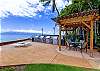 BBQ area with table spot so you can dine by the water after grilling.Pergala for shade in the Summer provides extra comfort.