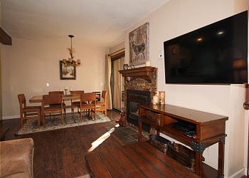 Dining area, tv and fireplace