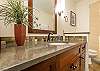 Double-sink vanity, separate toilet enclosure