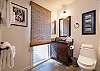 Plenty of lighting in guest bathroom