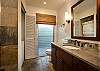 Large bathroom with stacked washer/dryer