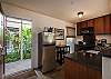 In-kitchen dining table compliments the breakfast bar
