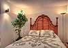 Queen bed in den