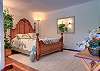Queen bed in den