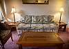 A comfortable queen sleeper sofa is provided in the living room