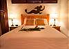 Comfy queen bed in master bedroom