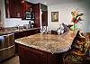 Granite counter tops provide plenty of space to prepare dinner