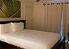The second guest bedroom, also with full-size bed