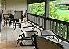 Plenty of comfortable seating for dining or relaxing on the main lanai off the living room