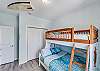 Bunk guest bedroom offers a twin and double bed