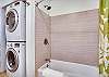 Unit B - Second bathroom located off hallway - includes washer and dryer