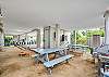 Unit B - outdoor picnic tables, BBQ and games