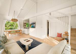 Which opens to the dining room and kitchen as well as stairs