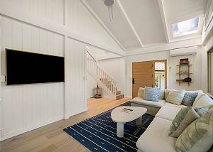 Cozy couch for watching movies on the flat screen TV