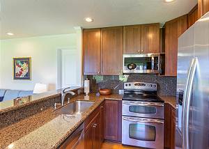 Kitchen is stocked with an assortment of kitchenware and gadgets