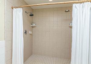 Nice dual shower heads in the spacious Master Bathroom.