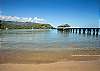 Hanalei Pier surrounded by the beauty of Kauai.