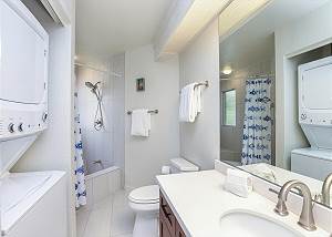 Master Bath with stack washer/dryer