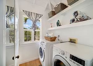 Washer and Dryer located off guest bathroom