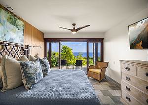 Guest bedroom with en suite bathroom and patio access