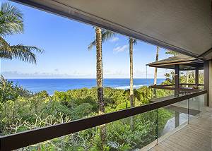 Balcony wraps around the back of the house for outside enjoyment