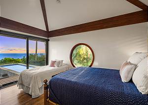 Downstairs guest room with a Queen bed and a Twin Bed