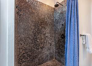 Pebble shower in the Master Bathroom