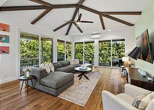 Gorgeous hardwood floors, high vaulted ceilings