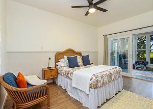 Newly remodeled guest bedroom with hardwood floors