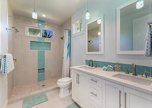Spacious bathroom with his and hers counter space