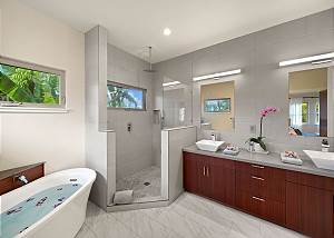 Luxurious rain shower, his and her sinks