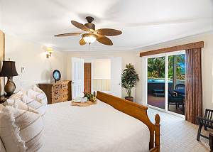 Master bedroom with entryway to outdoor lanai