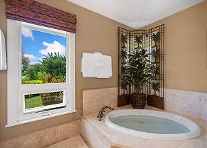 Soak in this spa-like tub with private tropical views