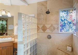 Walk in shower with beautiful stained glass windows