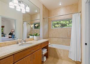 Guest bathroom with a tub